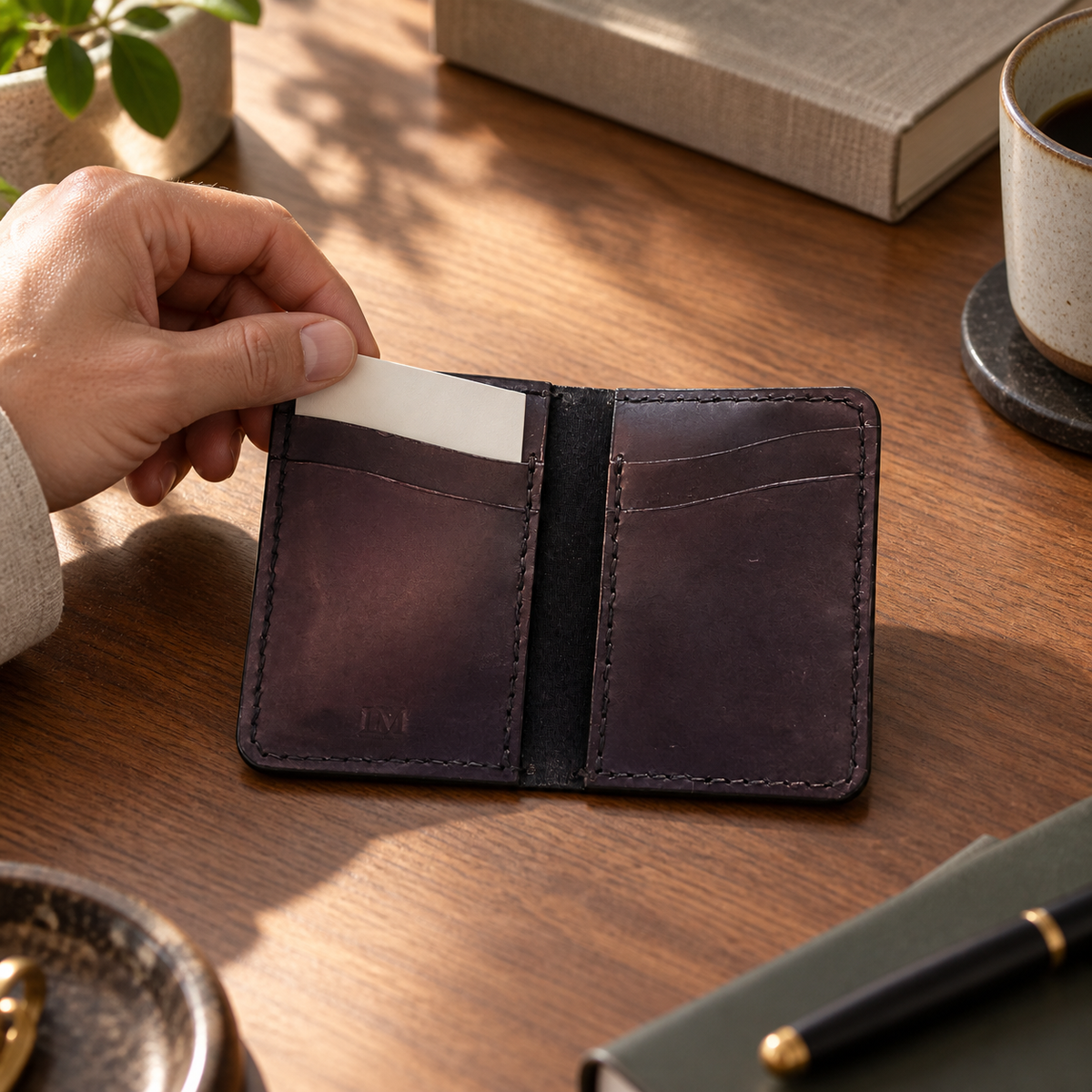 Aubergine Folded Card Holder, lifestyle shot, in use