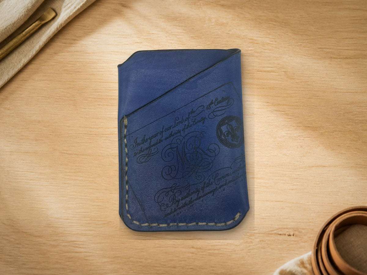 Flash Blue Fleur-de-Lis Business Card Holder, front showing engraved monogram and fleur-de-lis crest