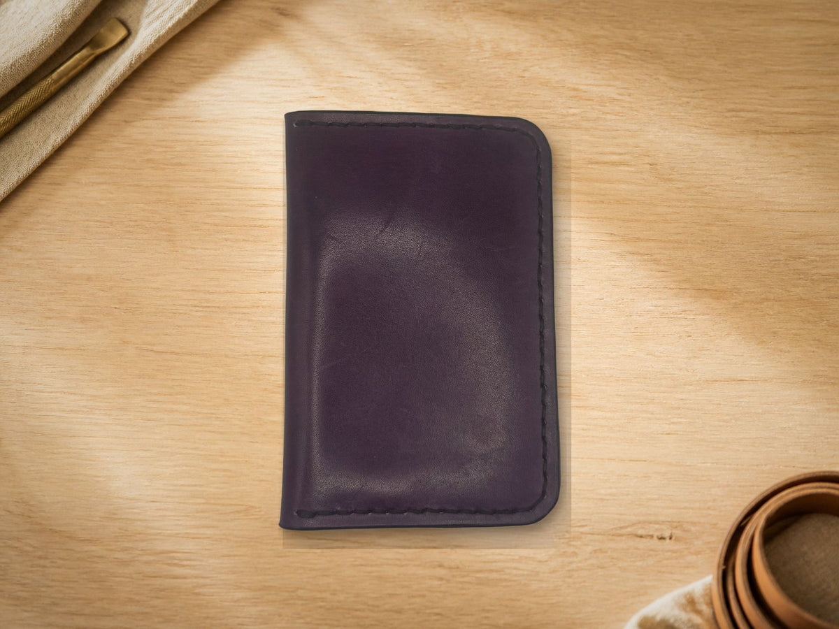 Aubergine Folded Card Holder, open showing black lining interior