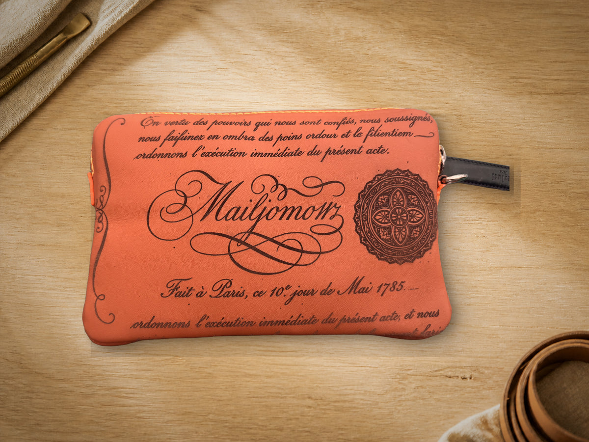 Terracotta Calligraphy Clutch, closed, front showing calligraphy engraving