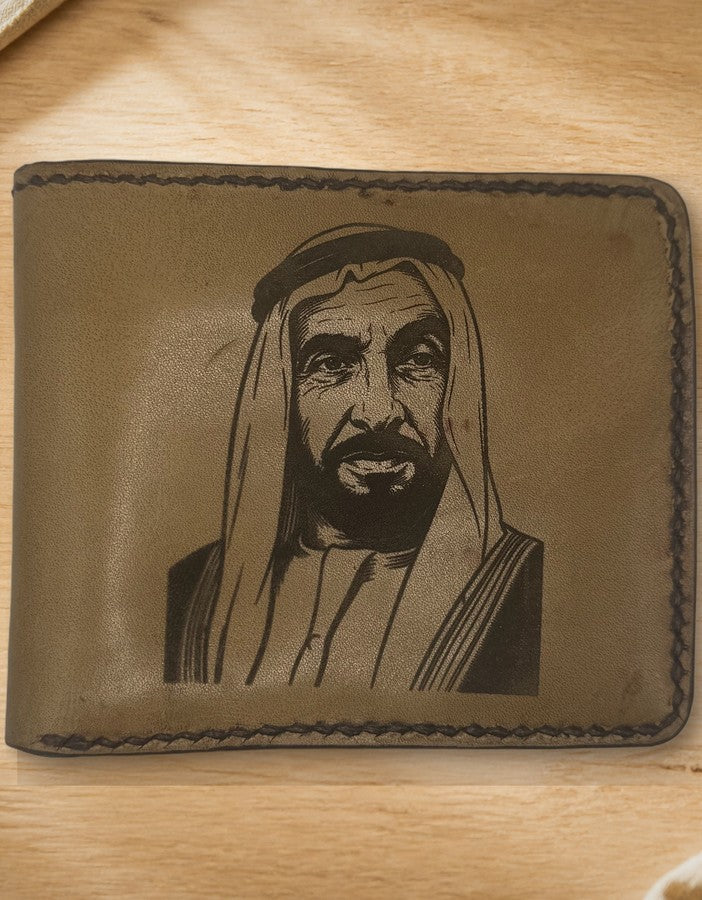 Hand-stitched bifold wallet held open, showing leather card slots